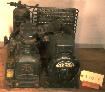 Open system refrigeration machine