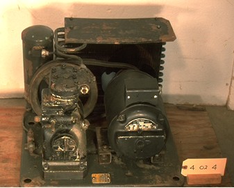 Open system refrigeration machine